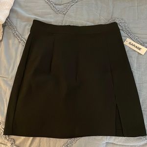 BNWT! Black mini skirt with mini slit and silver zipper